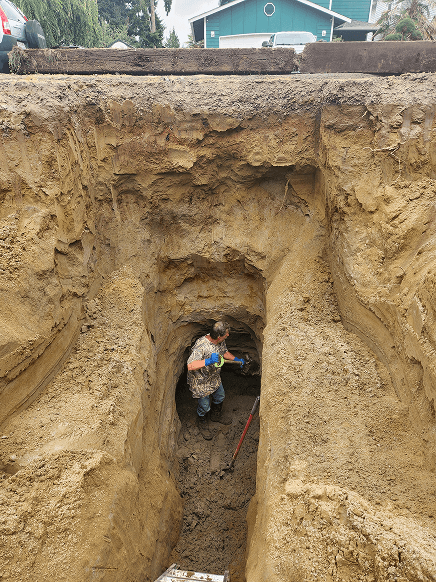 Louie in a deep hole.